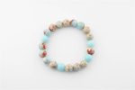 SHOUSHAN STONE 12-13MM POLISHED ROUND BEADS ON 10" LENGTH ELASTIC BEADED BRACELET FROM CHINA