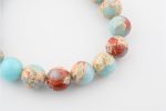 SHOUSHAN STONE 12-13MM POLISHED ROUND BEADS ON 10" LENGTH ELASTIC BEADED BRACELET FROM CHINA - Image 2
