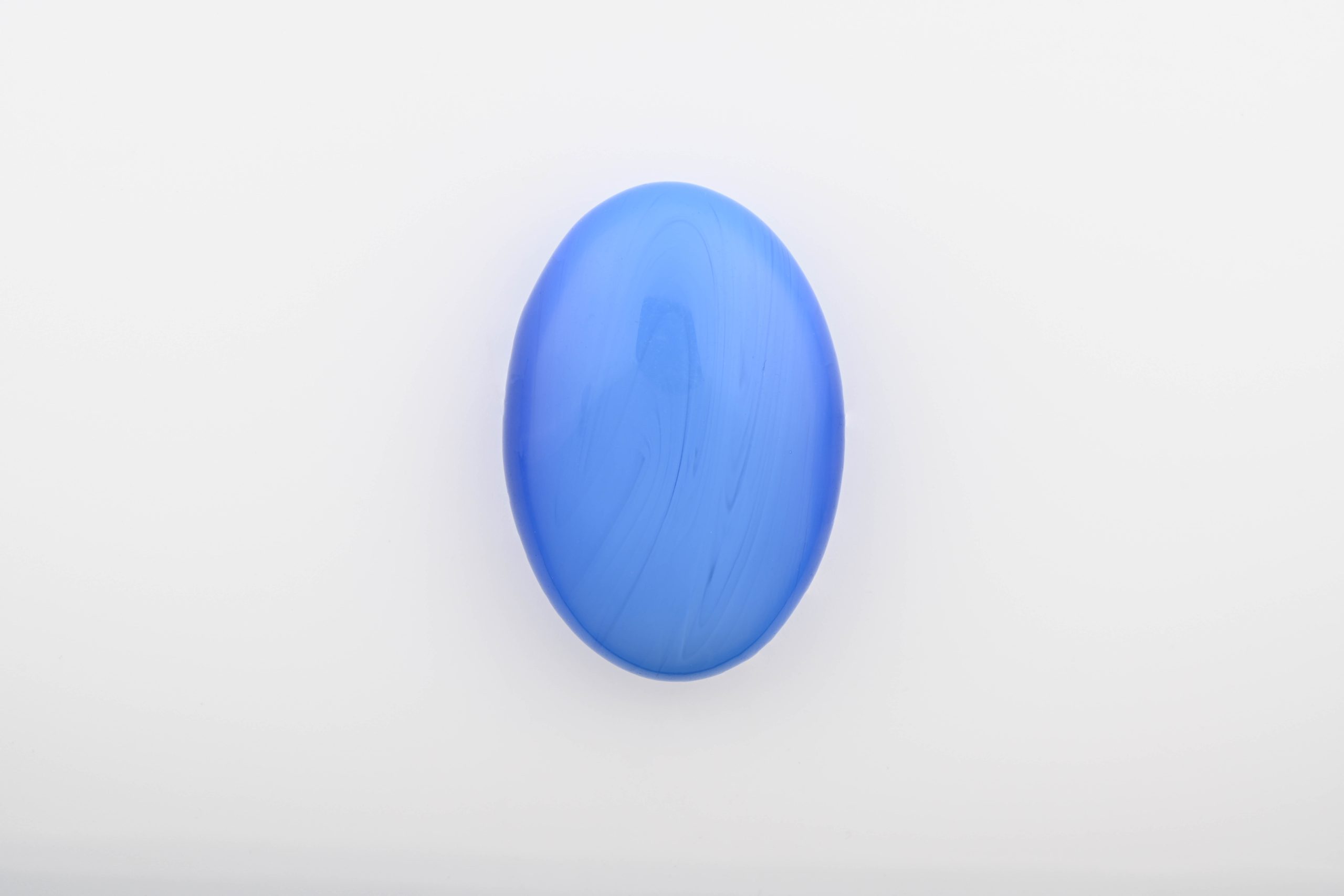 BOL-17-BLUE-OPALITE-PALM-STONE-BLUE-CHINA-POLISHED-FRONT-BAREFOOT-NATIVE.jpg AQUA BLUE OPALITE (OPAL GLASS MAN-MADE) POLISHED PALM STONE FROM CHINA - Image 1