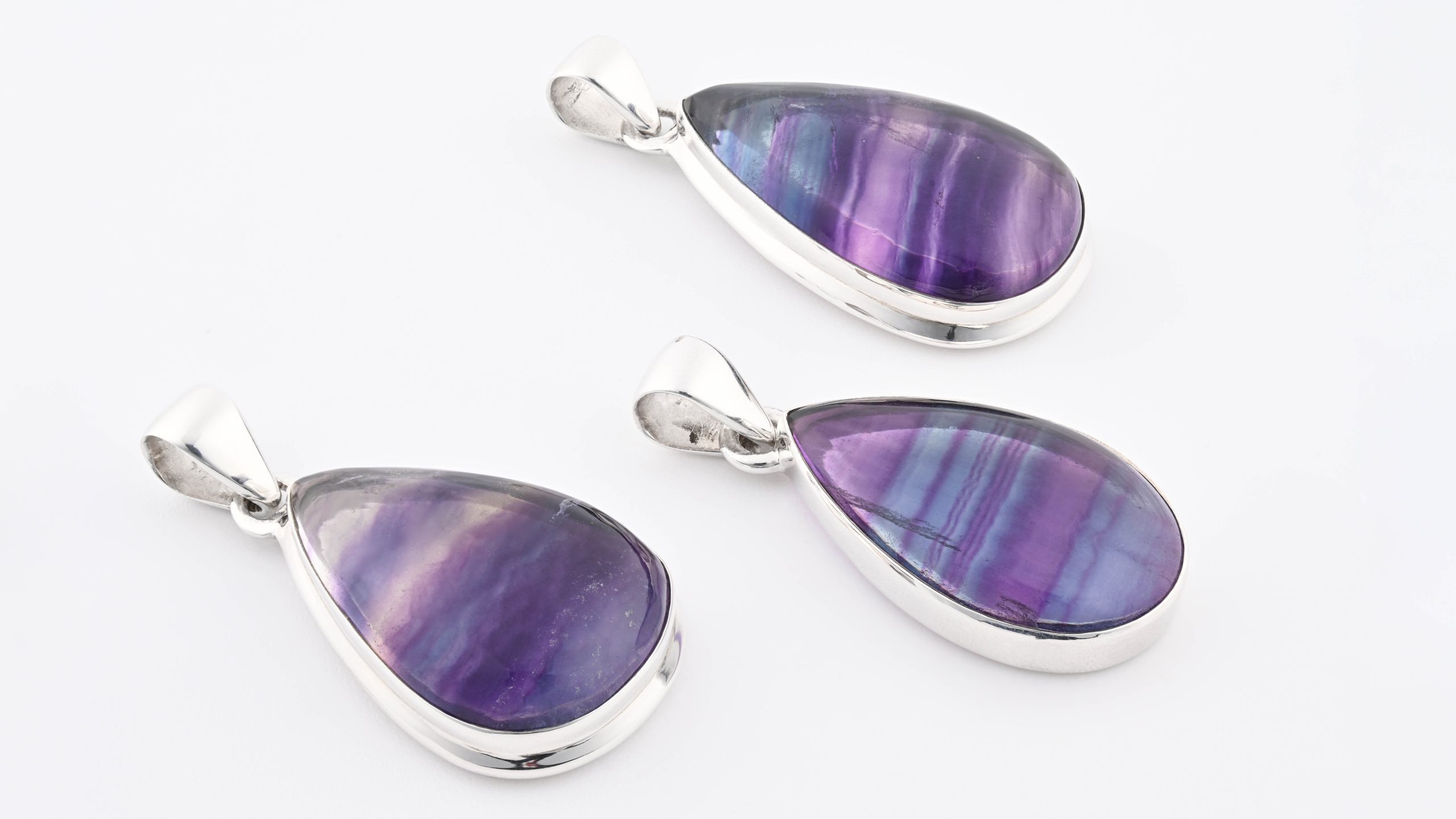 PP-P-FLU-RAINBOW-FLUORITE-PEAR-PENDANT-STERLING-SILVER-PURPLE-GREEN-BRAZIL-POLISHED-LEFT-SIDE-BAREFOOT-NATIVE.jpg Rainbow Fluroite (Brazil) Polished Stone on 0.925 Sterling Silver Pendant - Pear Stone - Image 1