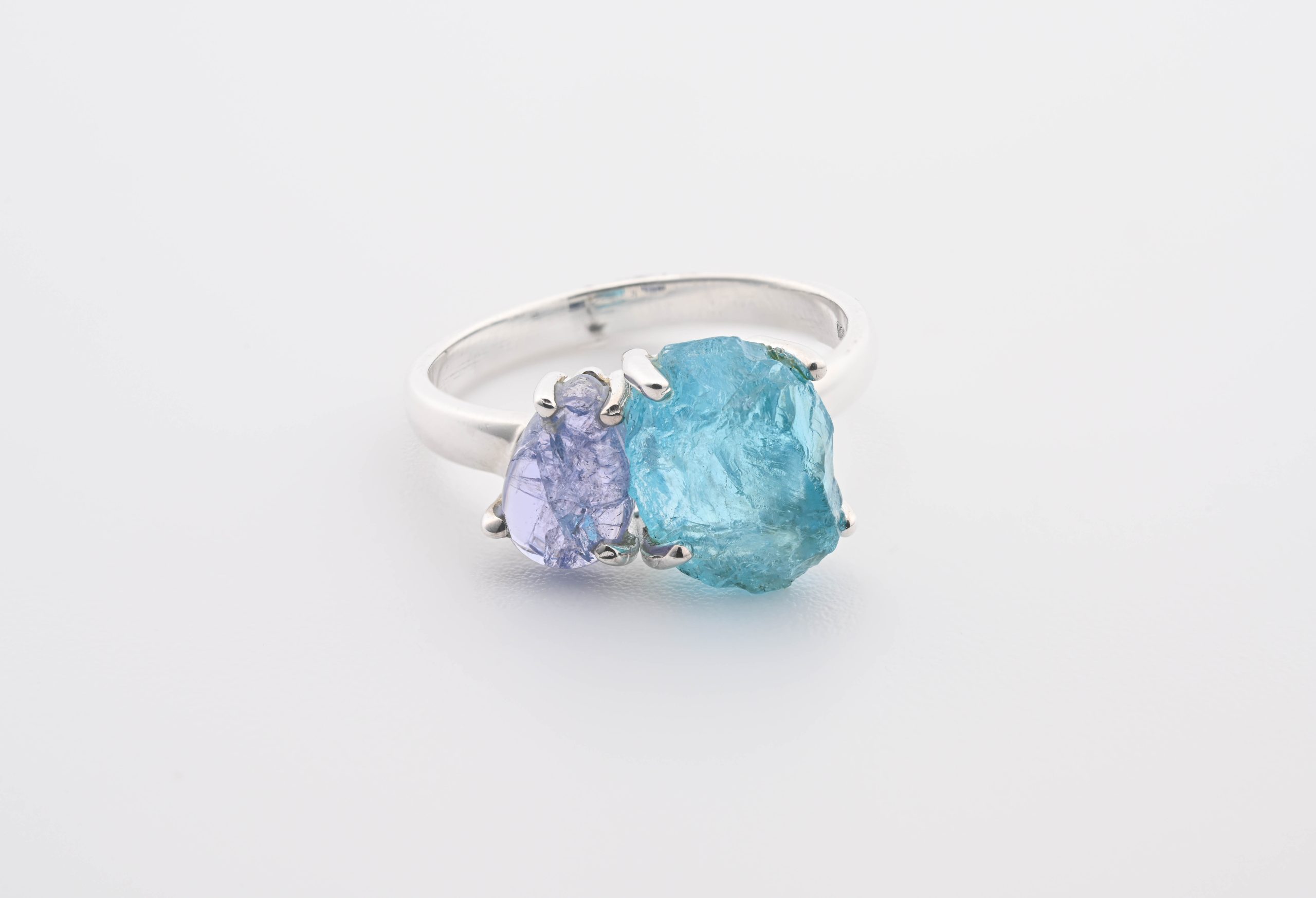 TAZ-BA-8.75-7.75-7.5-BLUE-APATITE-TANZANITE-RING-LAVENDER-LIGHT-BLUE-MADAGASCAR-TANZANIA-ROUGH-POLISHED-FRONT-BAREFOOT-NATIVE.jpg Double Stone Polished Tanzanite (Tanzania) & Rough Blue Apatite (Madagascar) On 0.925 Sterling Silver Ring Size - 8.75 - Image 1
