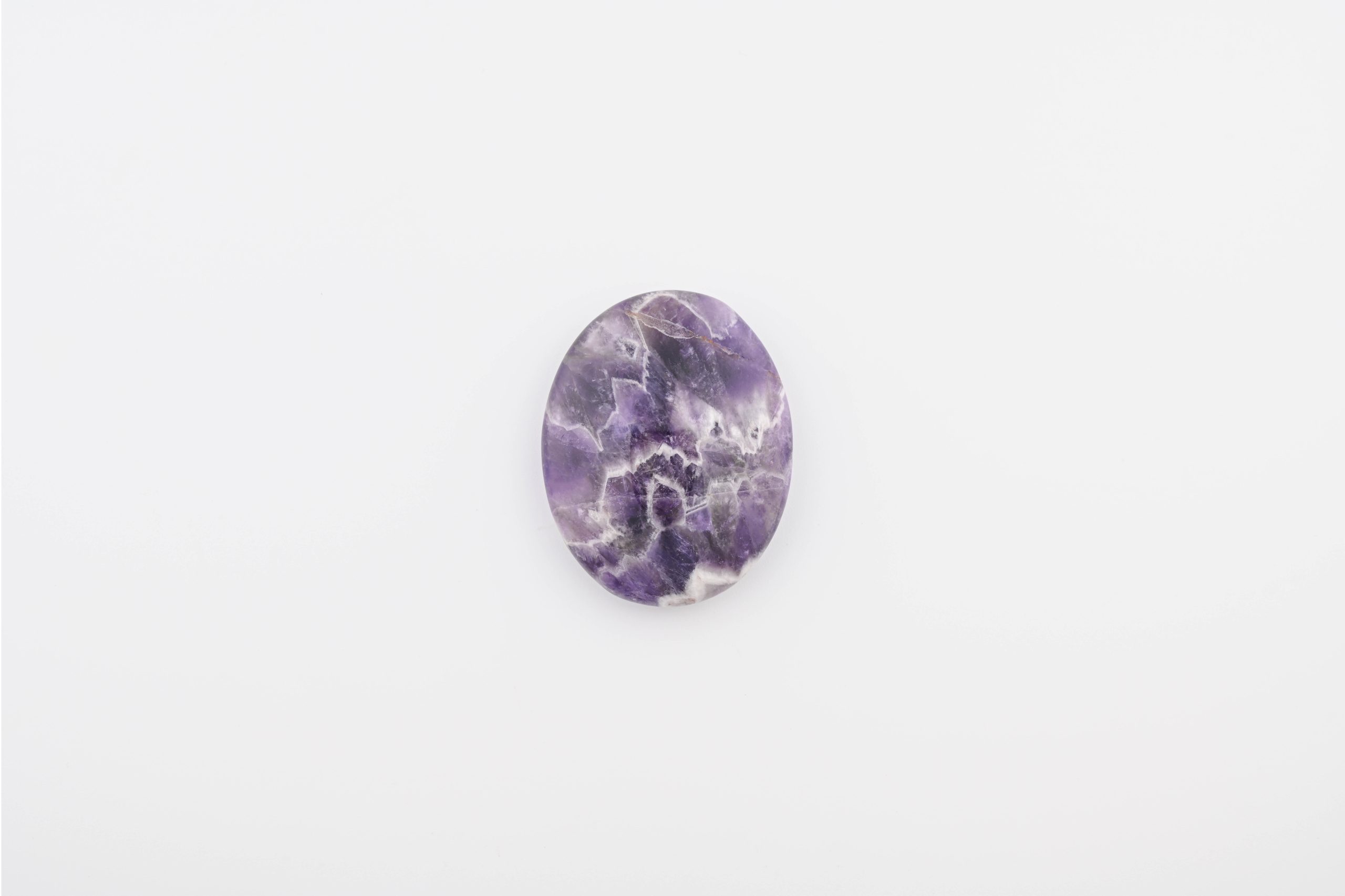a-100-chevron-amethyst-palm-stone-purple-brazil-polished-front-barefoot-native.jpg AMETHYST POLISHED POCKET STONE FROM BRAZIL - Image 1